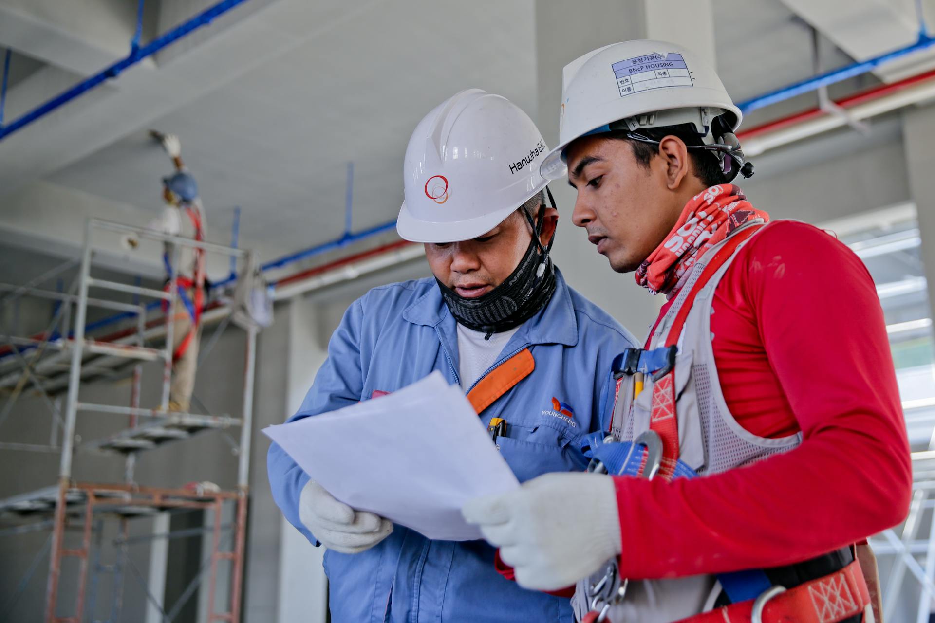 Workers at a construction site representing our mission